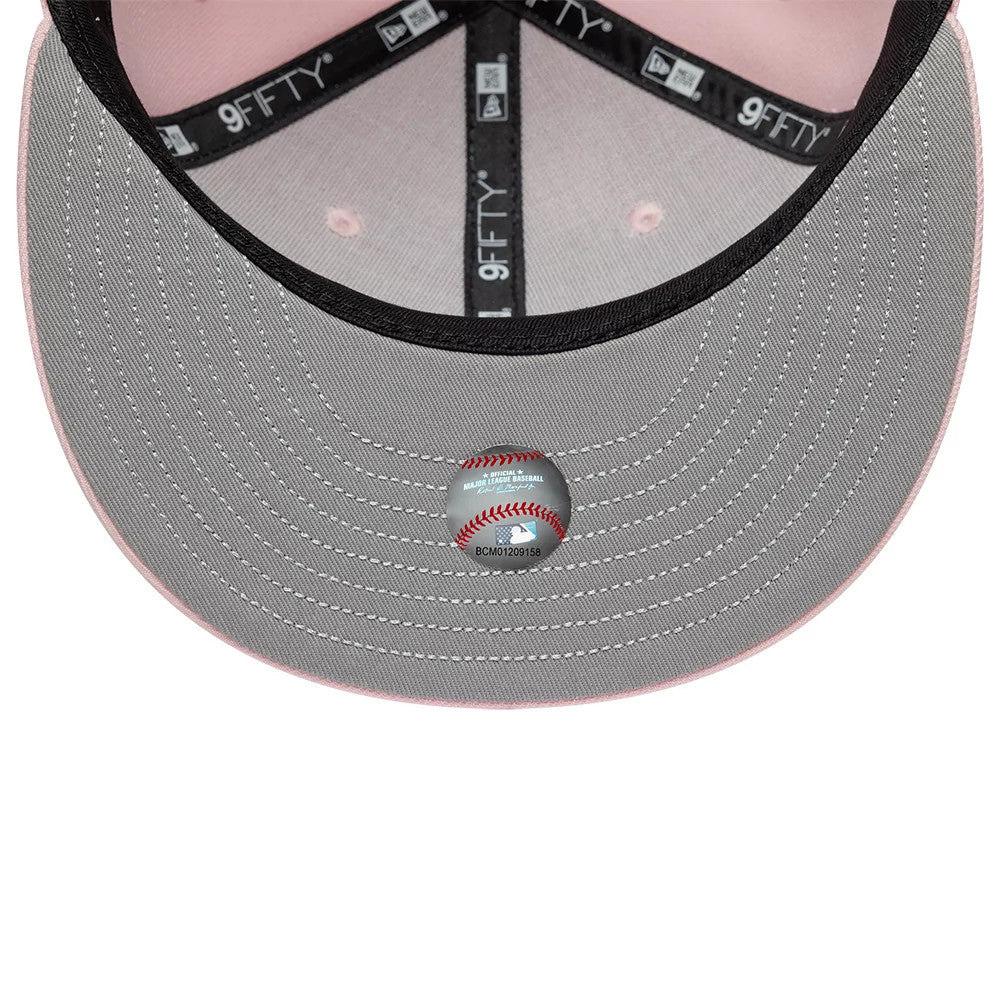 Pictured is this MLB Floral New York Yankees 9FIFTY Snapback cap in pastel pink. 2