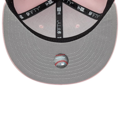 Pictured is this MLB Floral New York Yankees 9FIFTY Snapback cap in pastel pink. 2