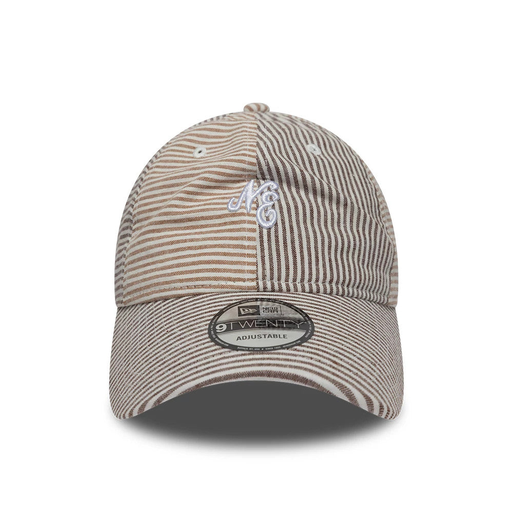 Pictured is this New Era Stripe Brand New Era 9TWENTY cap in beige and brown. 2