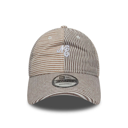 Pictured is this New Era Stripe Brand New Era 9TWENTY cap in beige and brown. 2
