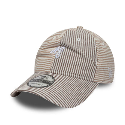 Pictured is this New Era Stripe 9TWENTY cap in beige and brown. 1