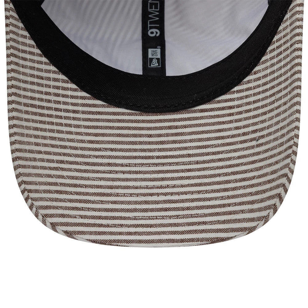 Pictured is this New Era Stripe Brand New Era 9TWENTY cap in beige and brown. 7