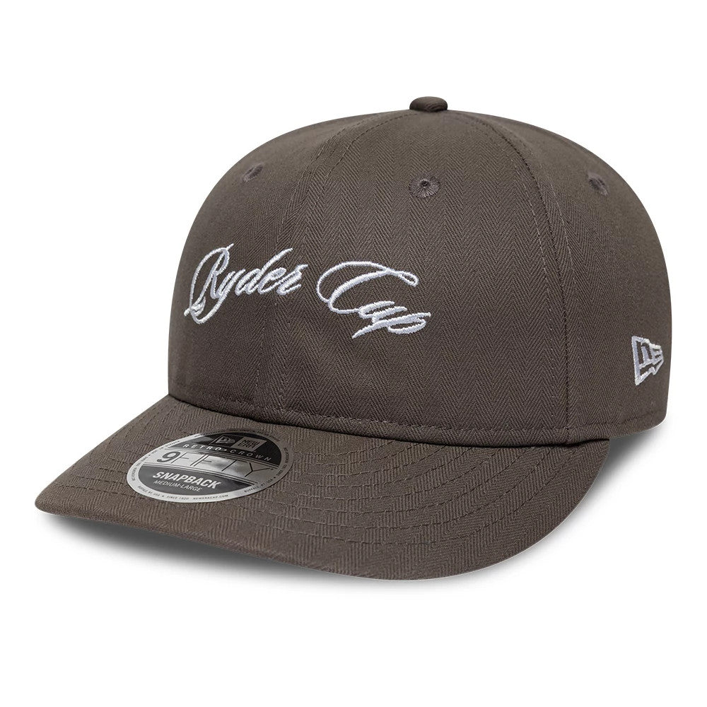 Ryder Cup 2027 Herringbone Grey New Era Retro Crown 9FIFTY Adjustable Cap, three-quarter view showing the white script embroidered front logo, grey herringbone pattern on the structured crown and visor, and a New Era flag logo on the left side.