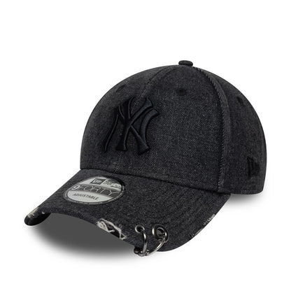 New York Yankees MLB Hardware Black New Era 9FORTY Adjustable Denim Cap, front view showing the raised black embroidered NY logo on the denim texture, distressed details on the curved visor, and a 9FORTY size sticker.