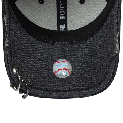 New York Yankees MLB Hardware Black New Era 9FORTY Adjustable Denim Cap, inside view with a black sweatband and grey panels, features a 9FORTY size sticker on the dark denim undervisor and silver rings on the left side of the visor.