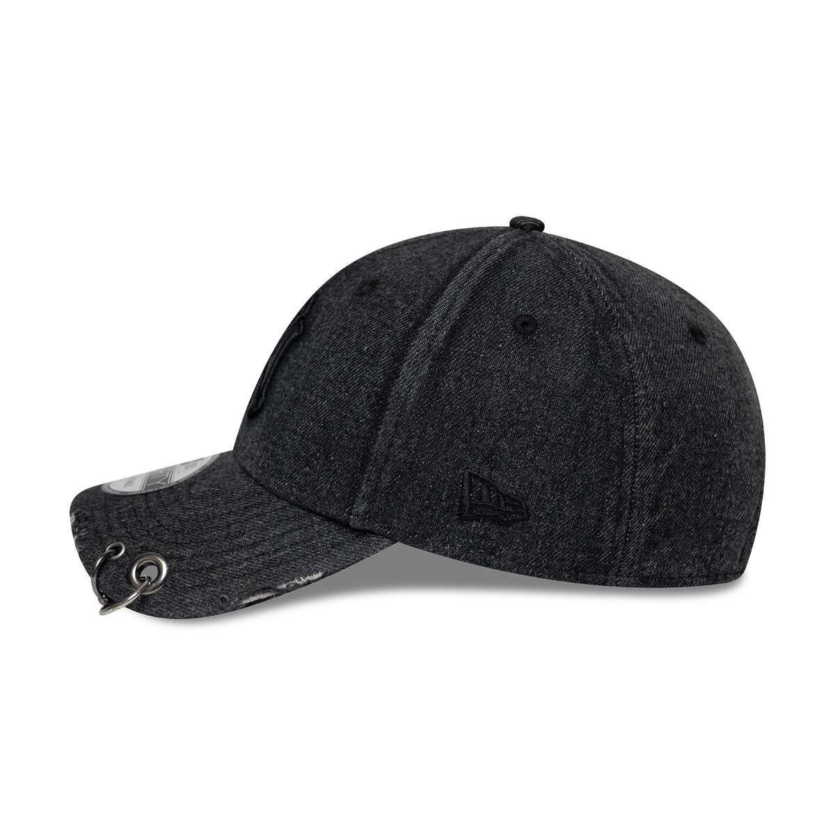 New York Yankees MLB Hardware Black New Era 9FORTY Adjustable Denim Cap, side view showing the black embroidered New Era flag logo on the left side of the black denim crown, with eyelets and a curved visor featuring a 9FORTY size sticker.