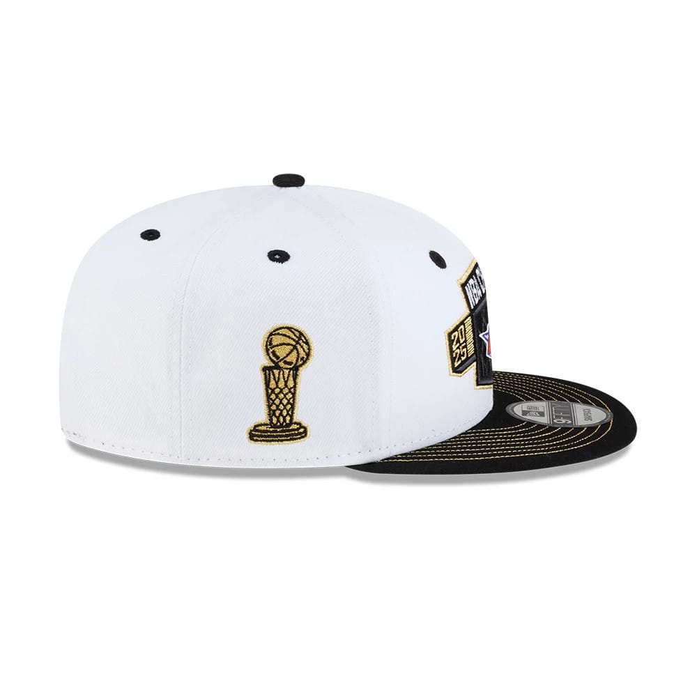 Pictured is this NBA Finals Champions 2026 New York Knicks 9FIFTY Snapback cap in white. 5