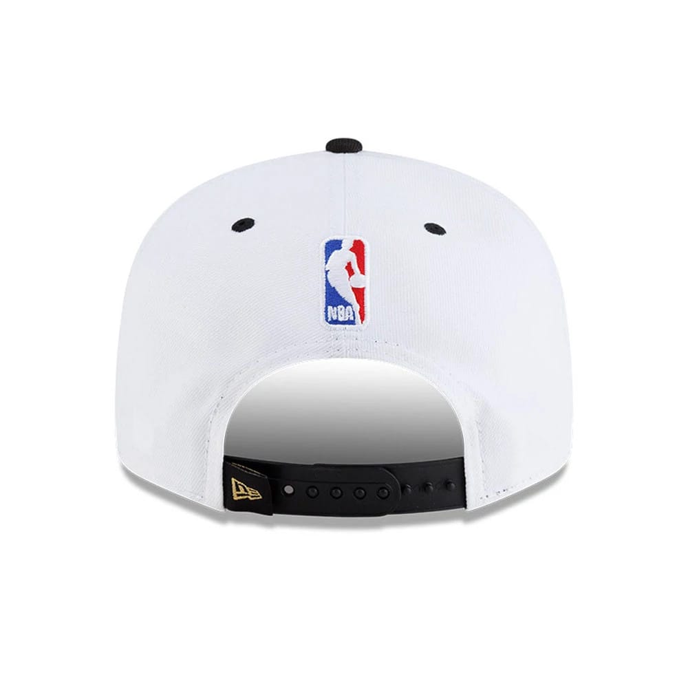 Pictured is this NBA Finals Champions 2026 New York Knicks 9FIFTY Snapback cap in white. 6