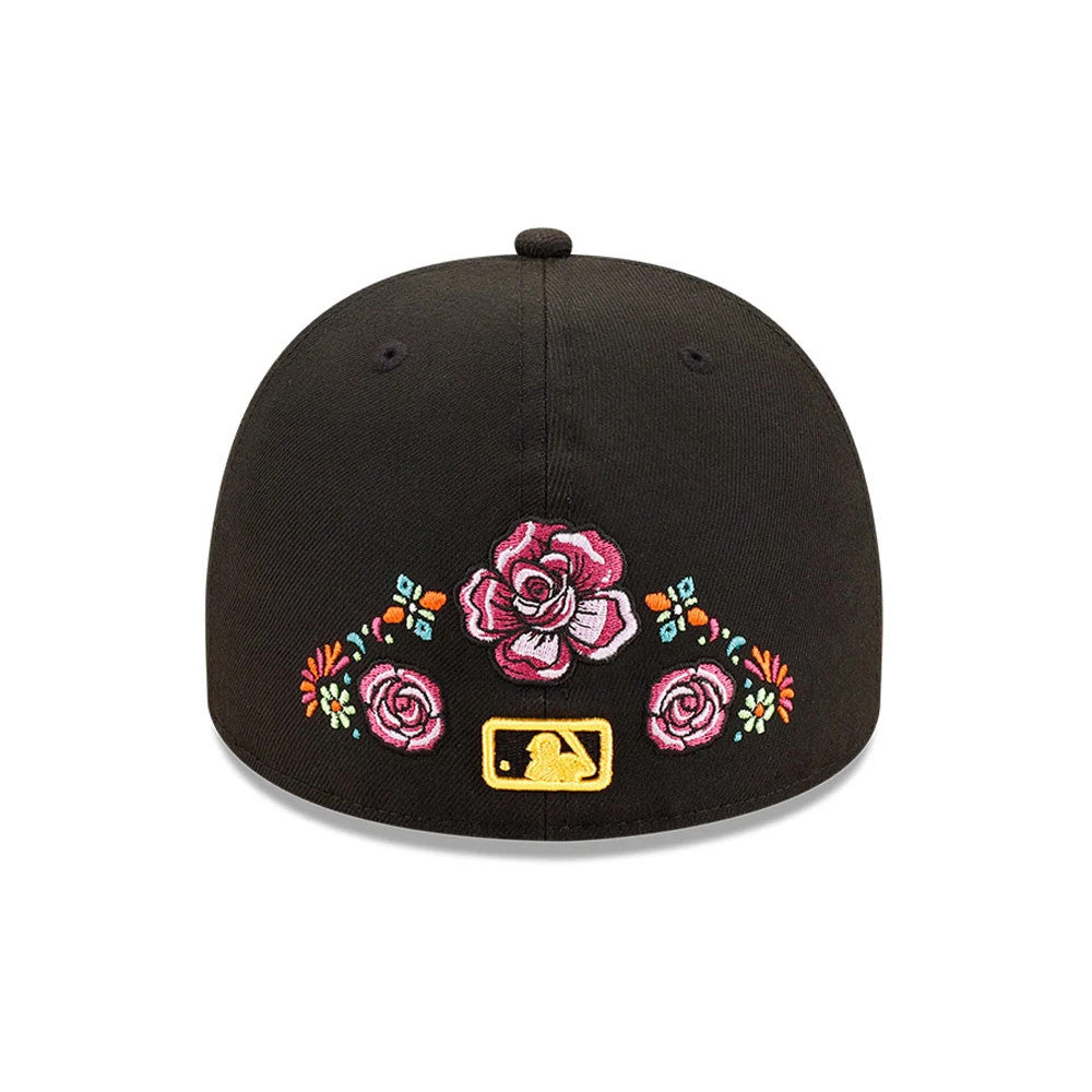 Yankees MLB Day Of The Dead Black New Era 59FIFTY A-Frame Fitted Cap, rear view showing embroidered floral designs with pink and orange flowers arranged above the gold MLB Batterman logo at the centre back of the black structured crown.