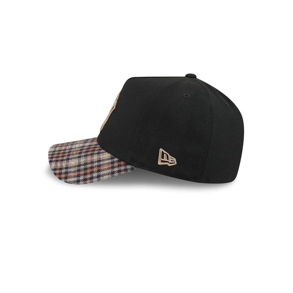 Yankees MLB Fabric Story Black New Era 59FORTY A-Frame Fitted Cap, side view showing the beige embroidered New Era flag logo on the left side, with a contrasting plaid-pattern visor and a structured black crown.