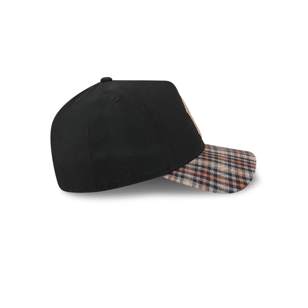 Yankees MLB Fabric Story Black New Era 59FORTY A-Frame Fitted Cap, side view showing the structured black crown with a plaid patterned visor, a top button in matching black, and stitching around the eyelets.