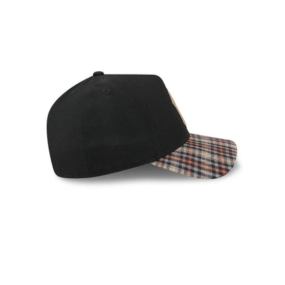 Yankees MLB Fabric Story Black New Era 59FORTY A-Frame Fitted Cap, side view showing the structured black crown with a plaid patterned visor, a top button in matching black, and stitching around the eyelets.