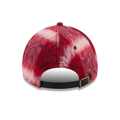 New Era New York Yankees MLB Fabric Story Red Casual Classic Adjustable Cap, rear view showing a plush red and white patterned fabric on the crown, an adjustable black strap with a bronze buckle, and no back logo.