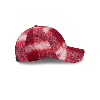 New Era New York Yankees MLB Fabric Story Red Casual Classic Adjustable Cap, side view showing the marbled red and white pattern on the structured crown, curved visor, and black detail at the rear, complete with eyelets and top button.