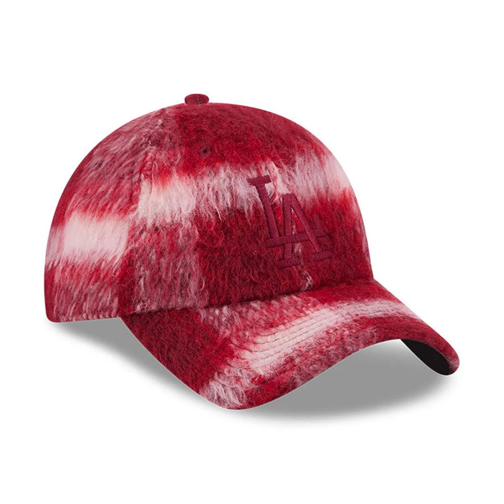 New Era LA Dodgers MLB Fabric Story Red Casual Classic Adjustable Cap, three-quarter view showing a red camo pattern with an embroidered LA logo on the front panel, curved visor, and a top button, all in a rich red fabric.