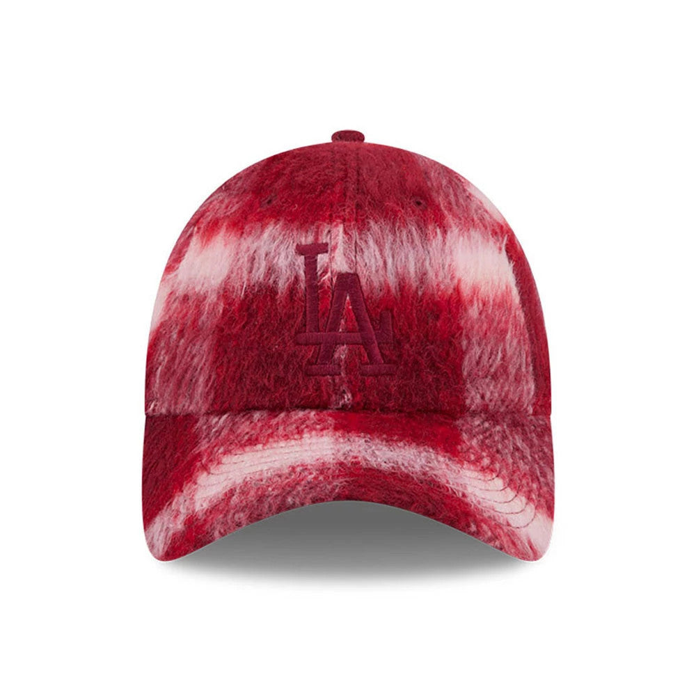 New Era LA Dodgers MLB Fabric Story Red Casual Classic Adjustable Cap, front view showing the red embroidered LA logo on a distinctive fuzzy red and white patterned crown, with a matching curved visor and top button.