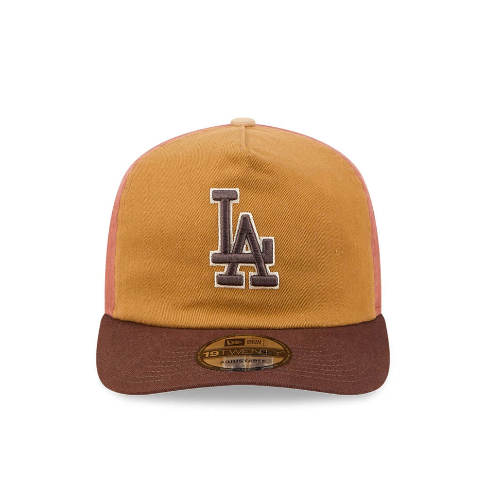LA Dodgers MLB Fall Story Multi New Era 19TWENTY Adjustable Cap, front view showing the white and brown embroidered LA logo on the brown crown, with a contrasting brown visor and a 19TWENTY size sticker on the underside.