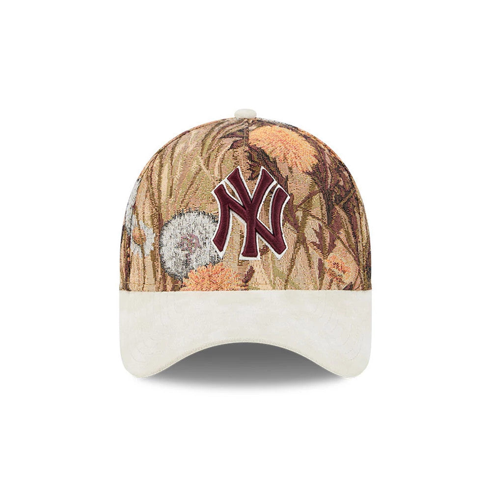Yankees MLB Fall Story Brown New Era 59FORTY A-Frame Fitted Cap, front view showing a burgundy embroidered NY logo on a nature-inspired patterned crown with autumn hues, complemented by a contrasting off-white curved visor and a top button.