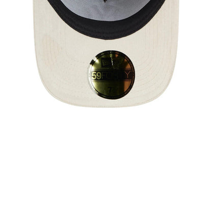 Yankees MLB Fall Story Brown New Era 59FORTY A-Frame Fitted Cap, inside view featuring a light grey undervisor, contrasting black sweatband, and a prominent gold 59FORTY size sticker centrally placed on the visor.