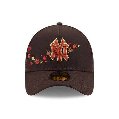 Yankees MLB Fall Story Dark Brown New Era 59FORTY A-Frame Fitted Cap, front view showing orange and red embroidered Yankees logo and autumn leaves pattern on the front panel, with a classic curved visor and a gold 59FORTY size sticker.