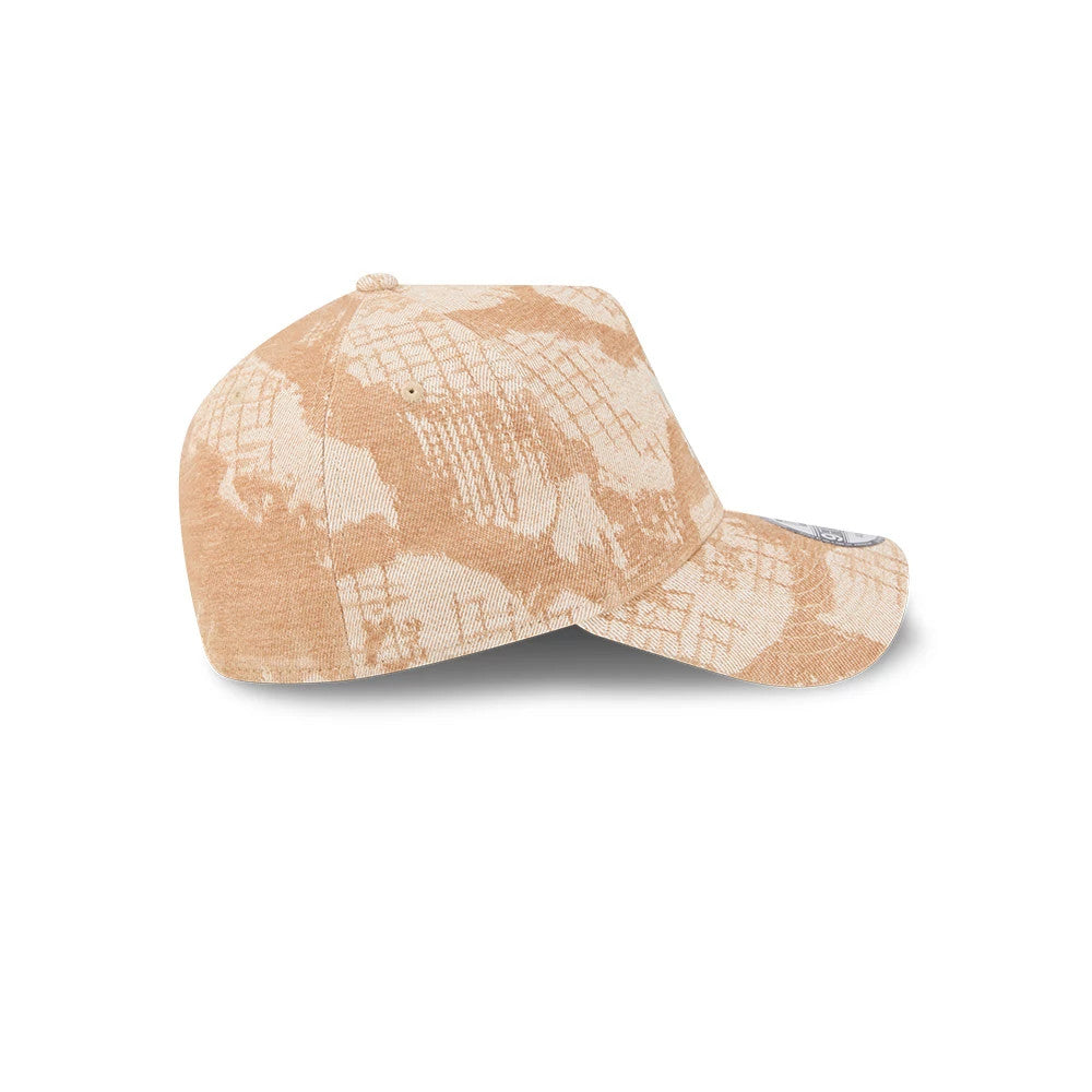 New York Yankees MLB Fall Story Dark Beige New Era 9FORTY A-Frame Adjustable Cap, side view showing an abstract beige and white pattern on the crown and visor, with eyelets and a curved visor featuring a 9FORTY size sticker.