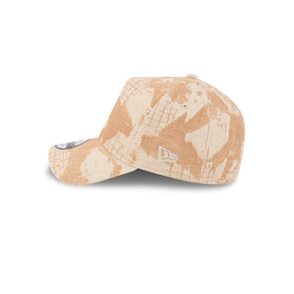 Chicago White Sox MLB Fall Story Beige New Era 9FORTY A-Frame Adjustable Cap, side view showing the white embroidered New Era flag logo on the left side, with a unique beige and cream abstract pattern covering the curved visor and structured crown.