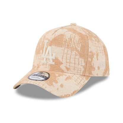 LA Dodgers MLB Fall Story Beige New Era 9FORTY A-Frame Adjustable Cap, three-quarter view showing a white raised embroidered LA logo centred on the front panels, a curved beige visor with a 9FORTY size sticker.
