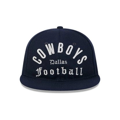 Dallas Cowboys NFL Historic Arch Dark Blue Retro Crown New Era 59FIFTY Fitted Cap, front view showing white embroidered Cowboys and Football lettering on the structured dark blue crown, with a flat dark blue visor and black embroidered eyelets.