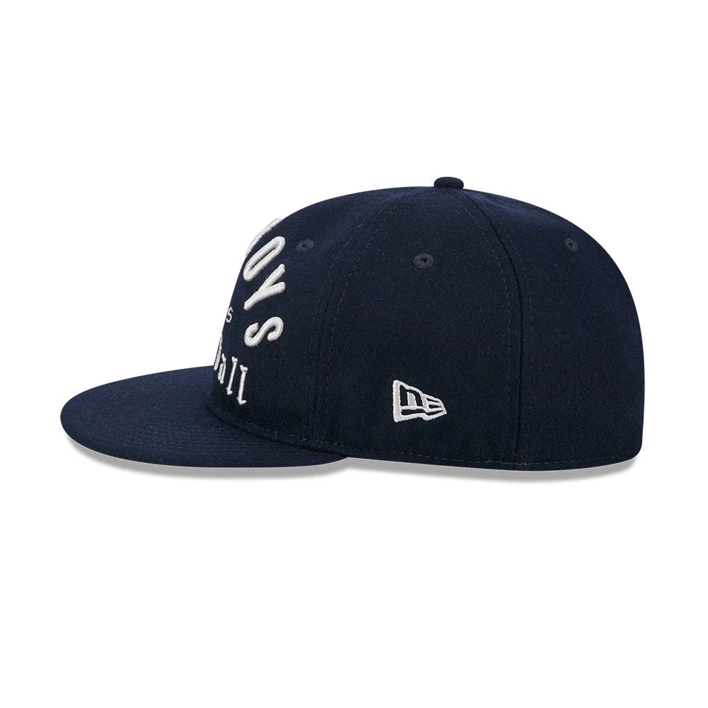 Dallas Cowboys NFL Historic Arch Dark Blue Retro Crown New Era 59FIFTY Fitted Cap, side view showing the embroidered New Era flag logo on the left side of the structured dark blue crown and the flat, matching visor.