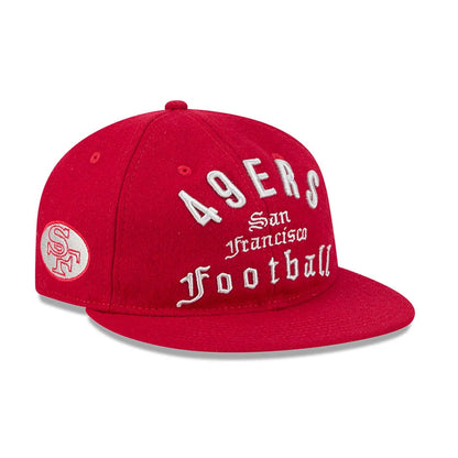 San Francisco 49ers NFL Historic Arch Red Retro Crown New Era 59FIFTY Fitted Cap, front view showing white embroidered lettering of 49ERS San Francisco Football on the red structured crown, with a flat red visor and an SF logo on the left side.