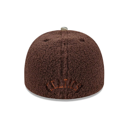 Boston Celtics NBA Hardwood Classic Brown New Era 59FIFTY A-Frame Fitted Cap, rear view showing CELTICS in orange raised embroidery on the brown textured crown, with a central top button and matching brown eyelets.