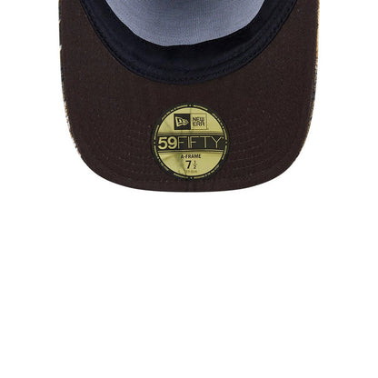 Boston Celtics NBA Hardwood Classic Brown New Era 59FIFTY A-Frame Fitted Cap, inside view showing the brown undervisor, a gold 59FIFTY size sticker at the centre, and a contrasting black sweatband around the edge.