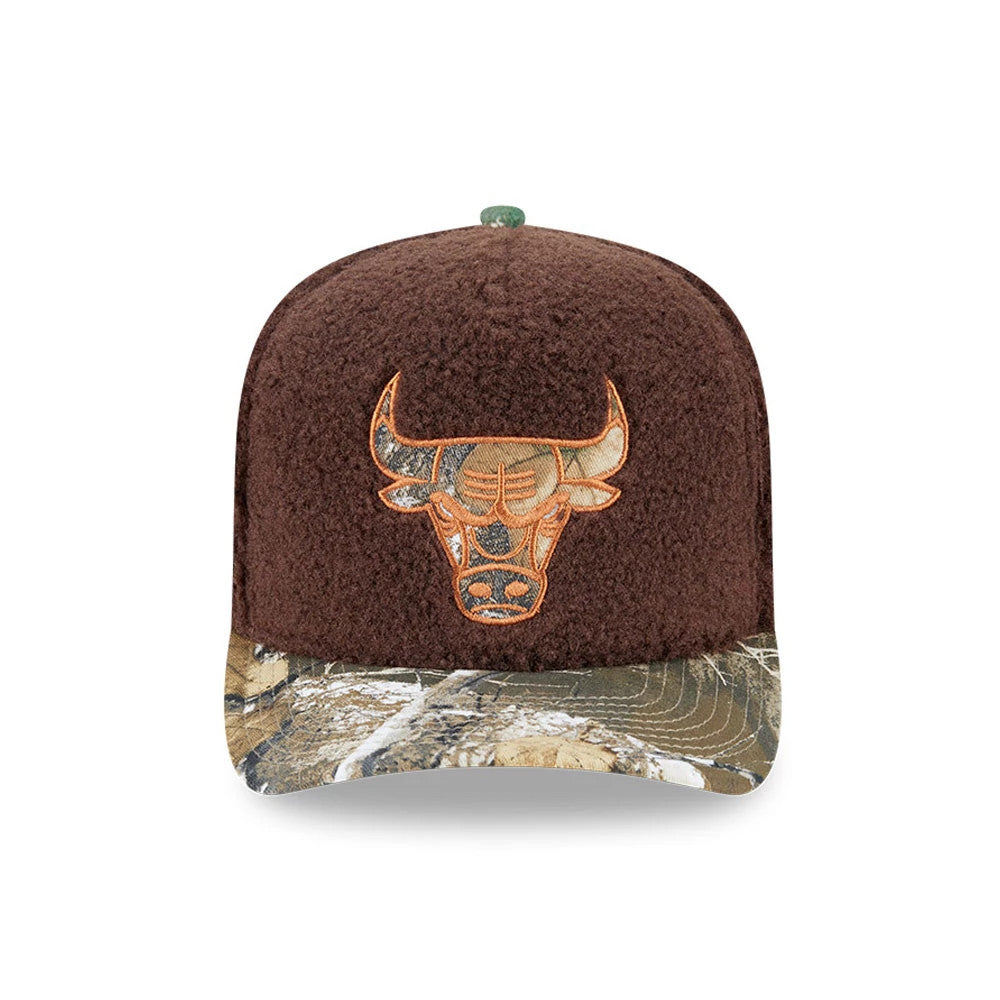 Chicago Bulls NBA Hardwood Classic Brown New Era 59FIFTY A-Frame Fitted Cap, front view showing an orange embroidered bull logo on a textured brown crown, with a camo patterned flat visor and a matching green top button.