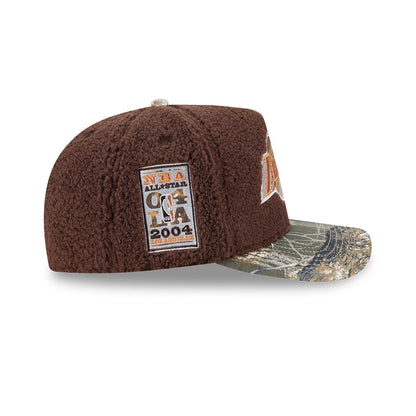 LA Lakers NBA Hardwood Classic Brown New Era 59FIFTY A-Frame Fitted Cap, side view showing a rectangular embroidered NBA All-Star patch on the brown sherpa crown, and a flat visor with a unique camo pattern and textured finish.