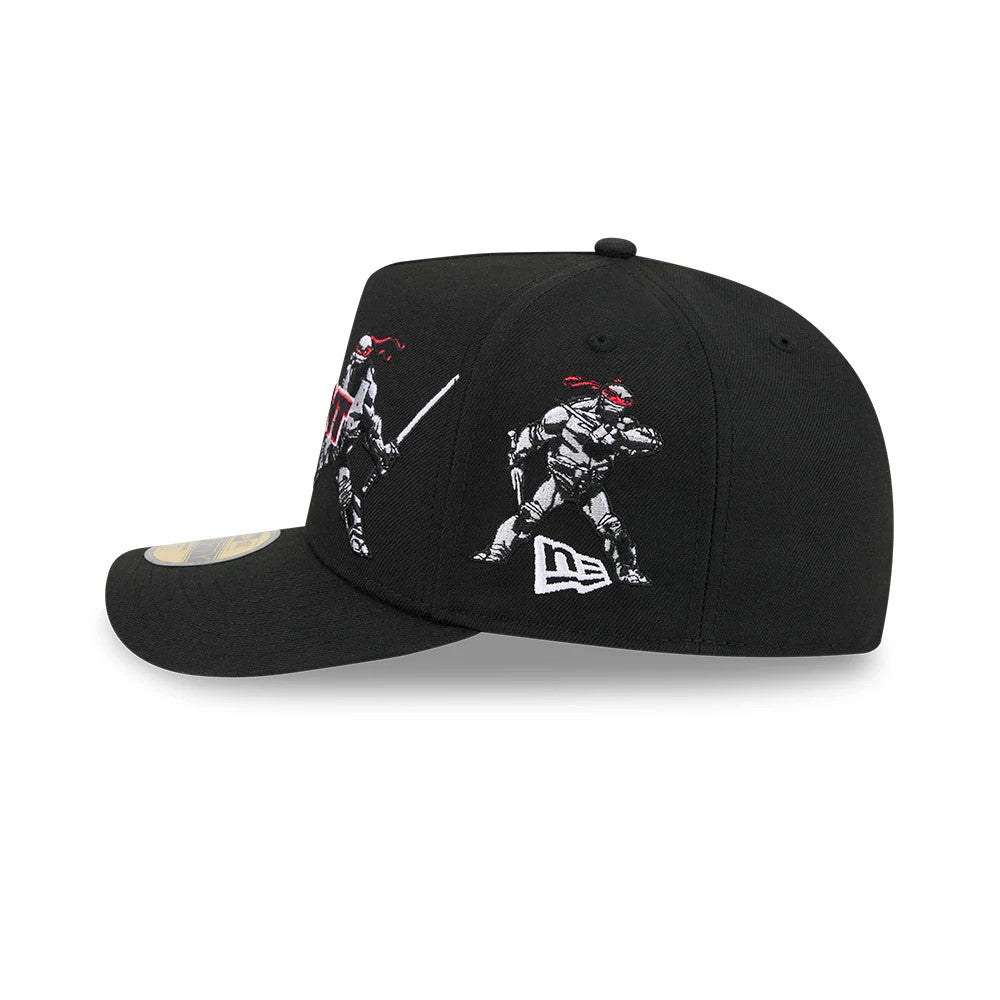 Teenage Mutant Ninja Heroes Black New Era 59FIFTY A-Frame Fitted Cap, side view showing embroidered graphics of two ninja figures with red masks on the right side panel, and the white New Era flag logo below on the structured black crown.