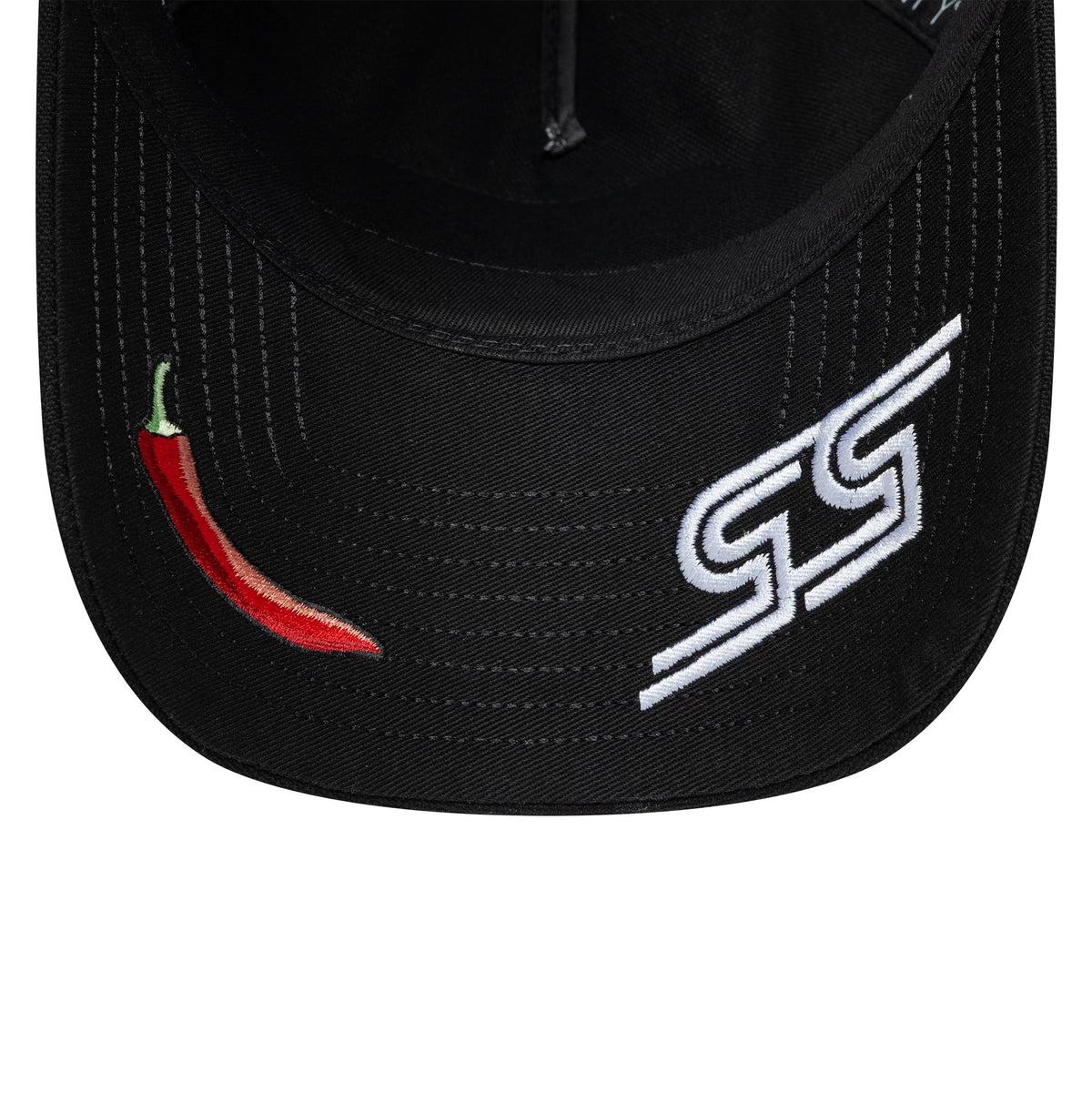 Williams Carlos Sainz Vegas Race Special Black New Era 9TWENTY A-Frame Adjustable Cap, inside view showing the black sweatband, black taping along the seams and a front visor with red chilli and white CS logo embroidery.