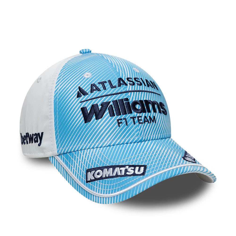 Williams Spain Race Special Blue New Era 9FORTY Adjustable Cap, three-quarter view showing the Williams F1 Team logo in navy raised embroidery on the textured blue front panels, with a curved visor and white side panels featuring a Betway logo.