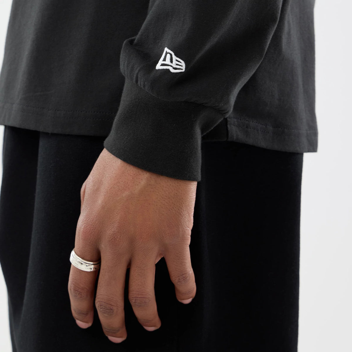 The model is wearing this Williams Vegas Race Special Long Sleeve T-Shirt in black. 5