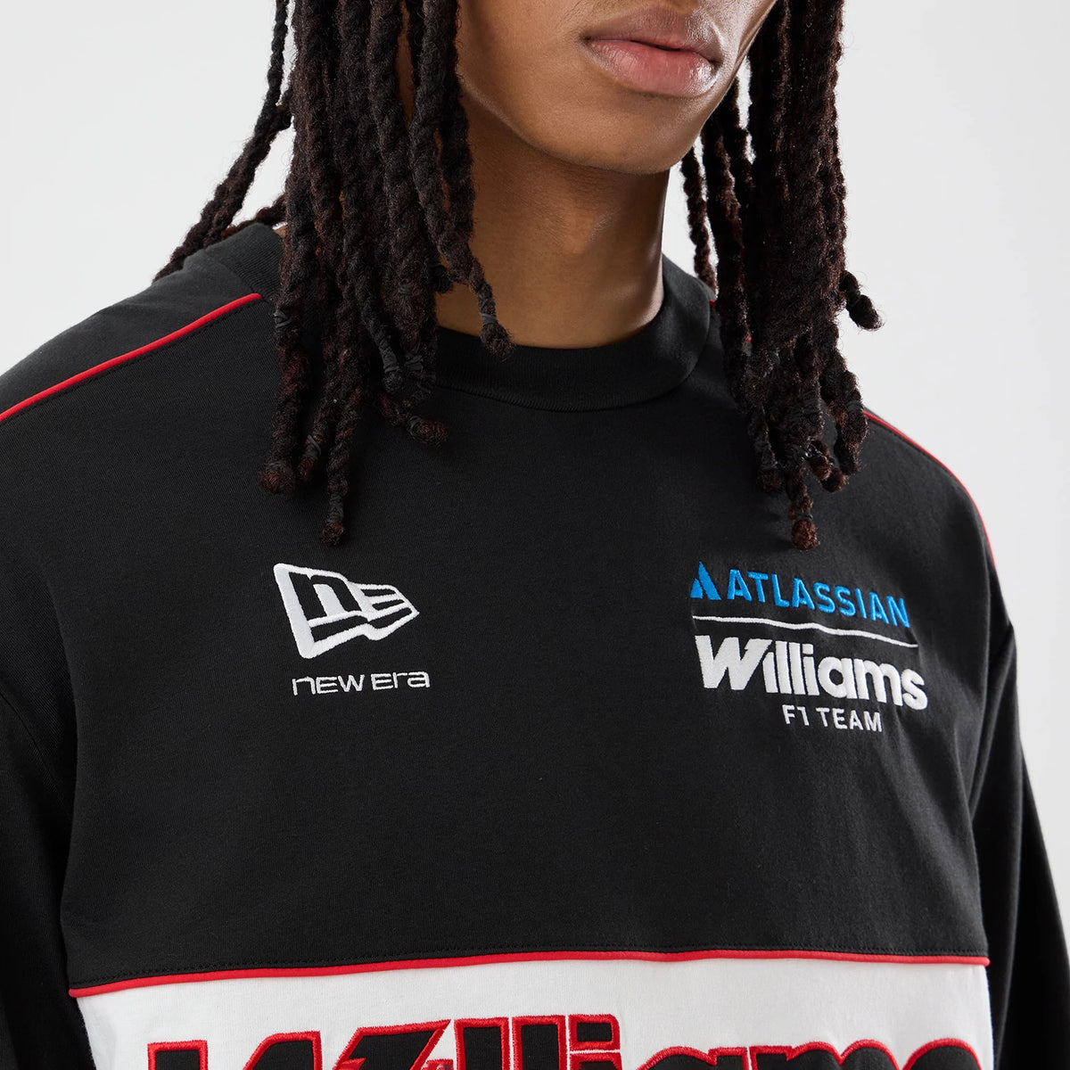 The model is wearing this Williams Vegas Race Special Long Sleeve T-Shirt in black. 3