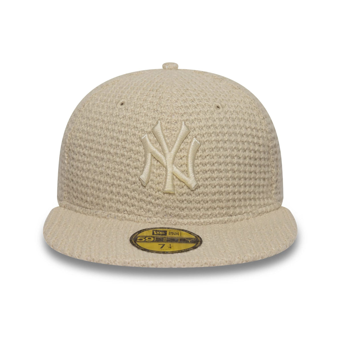 Pictured is this MLB Knitted New York Yankees 59FIFTY Fitted cap in light beige. 2