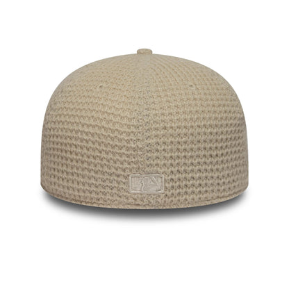 Pictured is this MLB Knitted New York Yankees 59FIFTY Fitted cap in light beige. 6