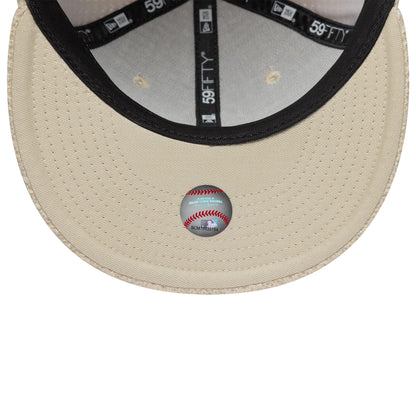 Pictured is this MLB Knitted New York Yankees 59FIFTY Fitted cap in light beige. 7