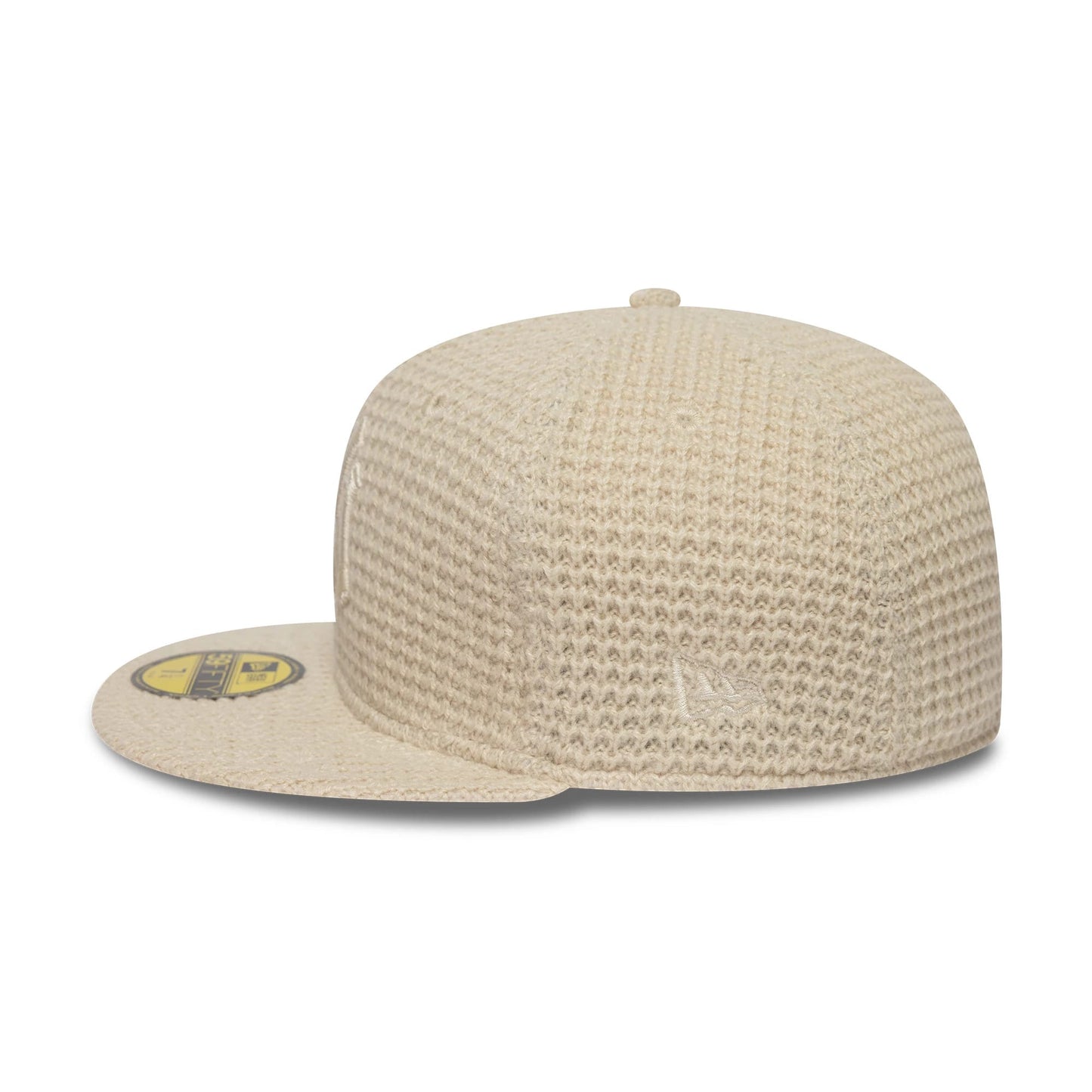 Pictured is this MLB Knitted New York Yankees 59FIFTY Fitted cap in light beige. 4