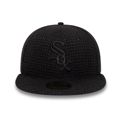 Pictured is this MLB Knitted Chicago White Sox 59FIFTY Fitted cap in black. 2