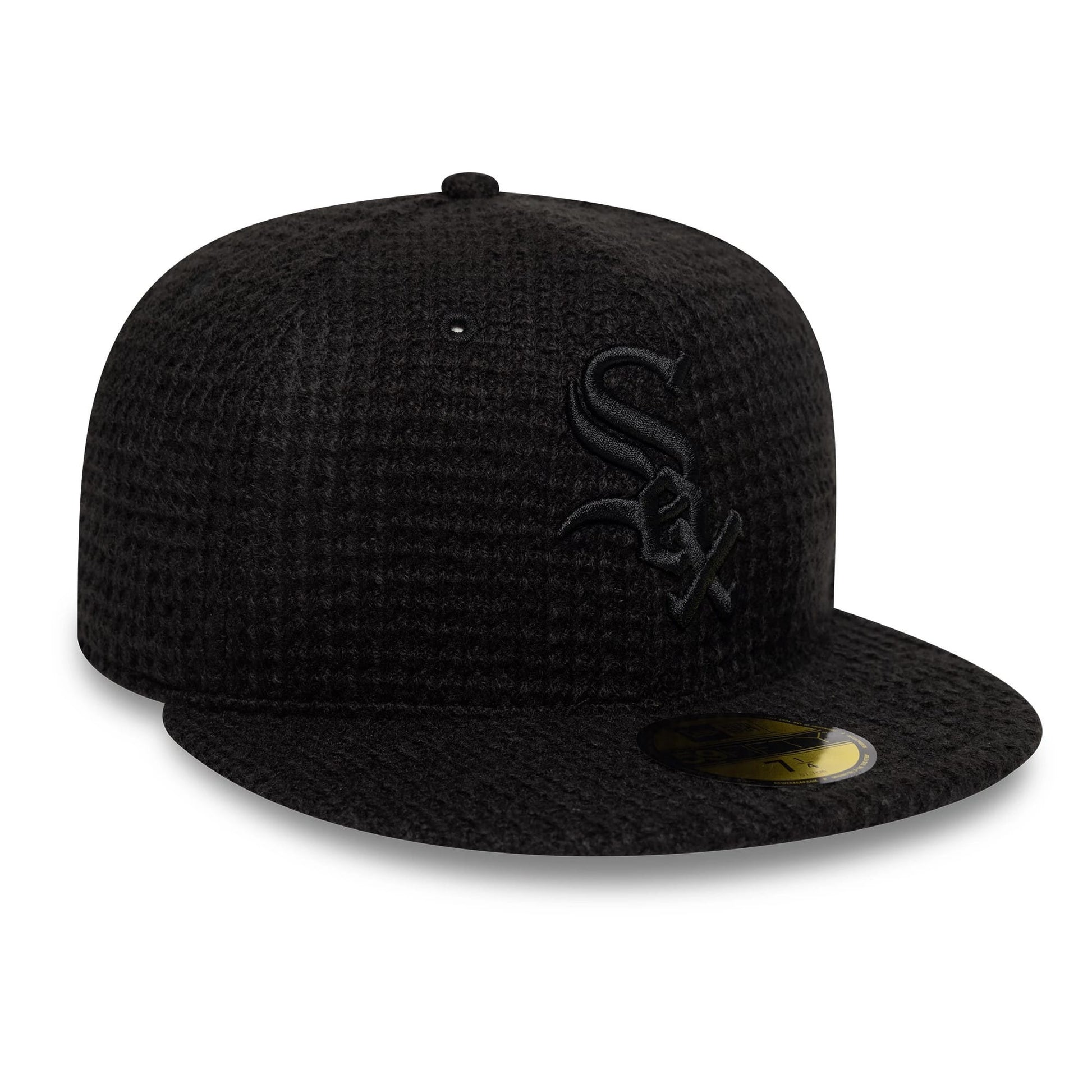 Pictured is this MLB Knitted Chicago White Sox 59FIFTY Fitted cap in black. 3