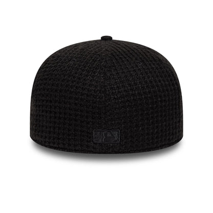 Pictured is this MLB Knitted Chicago White Sox 59FIFTY Fitted cap in black. 6