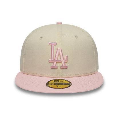 Pictured is this MLB League Essential LA Dodgers 59FIFTY Fitted cap in cream & pink. 2