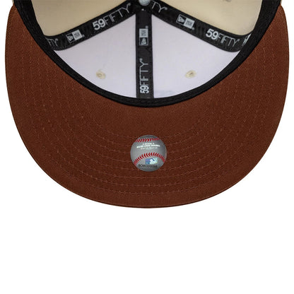 Pictured is this MLB League Essential Chicago White Sox 59FIFTY Fitted cap in cream & brown. 7