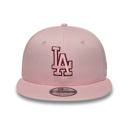 Pictured is this MLB Outline LA Dodgers 9FIFTY Snapback cap in pastel pink. 2