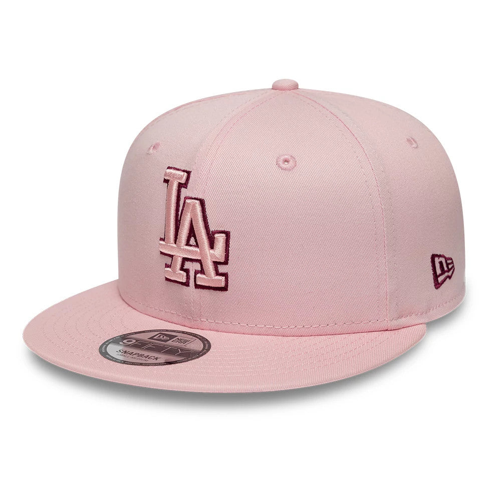 Pictured is this MLB Outline LA Dodgers 9FIFTY Snapback cap in pastel pink. 1